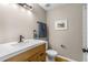Half bathroom showcasing updated vanity with a modern sink, toilet and towel rack at 750 E Harbor S Dr, St Petersburg, FL 33705