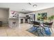 Bright dining area with stainless steel appliances and sliding glass door to the outside porch at 750 E Harbor S Dr, St Petersburg, FL 33705