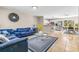 Open living room flowing into the kitchen with tile flooring and stylish decor at 750 E Harbor S Dr, St Petersburg, FL 33705