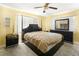 Bedroom featuring carpet, furniture, ceiling fan, and natural light at 801 37Th S Ave, St Petersburg, FL 33705