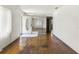Bright foyer showcasing hardwood floors, neutral walls, and glass-paneled door at 801 37Th S Ave, St Petersburg, FL 33705