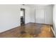 Open-concept living room featuring hardwood floors and a bright, neutral color scheme at 801 37Th S Ave, St Petersburg, FL 33705