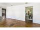 Bright living room with hardwood floors leading into the dining area at 801 37Th S Ave, St Petersburg, FL 33705