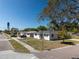 Charming single-story home in a peaceful neighborhood with mature trees and well-maintained lawns at 801 37Th S Ave, St Petersburg, FL 33705