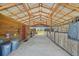 View of the barn featuring horse stalls and a secure design to protect animals from weather and provides proper ventilation at 808 Old Welcome Rd, Lithia, FL 33547