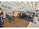 Spacious garage area with workout equipment and bike storage racks at 808 Old Welcome Rd, Lithia, FL 33547
