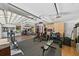 View of garage featuring workout equipment, storage and natural light at 808 Old Welcome Rd, Lithia, FL 33547