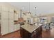Well-appointed kitchen with stainless steel appliances, ample counter space, and a view of the outdoor pool area at 808 Old Welcome Rd, Lithia, FL 33547