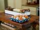 Close-up of farm-fresh eggs in a decorative bowl on a wooden counter with kitchen accessories in the background at 808 Old Welcome Rd, Lithia, FL 33547