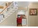 Cozy office space underneath the stairs with a custom desktop and drawers for efficient storage at 808 Old Welcome Rd, Lithia, FL 33547