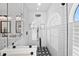 Modern shower featuring subway tile, black accents and fixtures, and decorative star tile floor at 808 Old Welcome Rd, Lithia, FL 33547