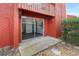 Patio with sliding glass door into a brick building at 8224 11Th N St # A, St Petersburg, FL 33702