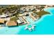 Stunning aerial view of the community pool, beach, and surrounding areas at 8261 Ivy Stark Blvd, Wesley Chapel, FL 33545