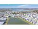 A panoramic view highlighting a community surrounded by serene lakes, adding to the neighborhood's scenic allure at 8261 Ivy Stark Blvd, Wesley Chapel, FL 33545