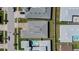 A bird's-eye view showcases the property's location within a well-planned community and landscaped surroundings at 8261 Ivy Stark Blvd, Wesley Chapel, FL 33545