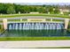 Grand community entrance featuring a modern water feature and the 'Epperson' sign, creating a welcoming atmosphere at 8261 Ivy Stark Blvd, Wesley Chapel, FL 33545