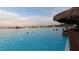 Stunning turquoise lagoon scene filled with people enjoying various water activities and the tropical scenery at 8261 Ivy Stark Blvd, Wesley Chapel, FL 33545