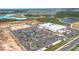 Aerial view of neighborhood retail area near a community, featuring a grocery store with ample parking at 8261 Ivy Stark Blvd, Wesley Chapel, FL 33545