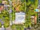 An aerial view of the home showing the perimeter of the property line at 8693 15Th N St, St Petersburg, FL 33702