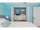 Bedroom closet features built in organizers, drawers, and shelving in a well lit room at 8693 15Th N St, St Petersburg, FL 33702