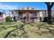 Two-story apartment building with wooden staircases and large, well-maintained lawn at 9031 Westchester Cir # 126, Tampa, FL 33604