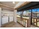 Outdoor porch featuring washer and dryer hookups and neighborhood views at 9031 Westchester Cir # 126, Tampa, FL 33604