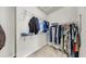 Walk-in closet with shelving and hanging racks for ample storage at 10209 Spanish Breeze Ct, Riverview, FL 33578