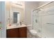 Modern bathroom featuring a vanity with a sink and glass shower at 10623 Pearl Berry Loop, Land O Lakes, FL 34638