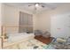 ' bedroom featuring a play area with plenty of space for activities at 10623 Pearl Berry Loop, Land O Lakes, FL 34638