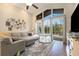 Comfortable living space with plush seating and natural light, ideal for relaxation and Gathering time at 10623 Pearl Berry Loop, Land O Lakes, FL 34638