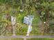 Birds eye view shows the property with an RV, boat and marked property line at 1126 Oxbow Rd, Wimauma, FL 33598
