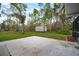 Large backyard features a storage shed and plenty of space for outdoor activities at 1126 Oxbow Rd, Wimauma, FL 33598