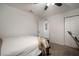 A bright bedroom with carpet flooring and a standard closet at 1126 Oxbow Rd, Wimauma, FL 33598