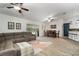 Open concept living room with a dining area and partial view of the kitchen at 1126 Oxbow Rd, Wimauma, FL 33598