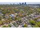 Expansive aerial view of a neighborhood showcasing its lush greenery, cityscape, and a conveniently located home at 1205 13Th N St, St Petersburg, FL 33705