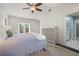 Bedroom featuring a dresser and an exterior door leading to the back yard at 1205 13Th N St, St Petersburg, FL 33705