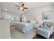 Bedroom featuring a chair with footstool, ceiling fan, and plenty of natural light at 1205 13Th N St, St Petersburg, FL 33705