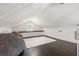 Bonus room featuring high ceilings, a dormer window, and hardwood floors at 1205 13Th N St, St Petersburg, FL 33705