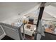 Bright living room with vaulted ceilings, hardwood floors, and white sofa at 1205 13Th N St, St Petersburg, FL 33705