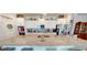 Spacious kitchen with granite countertops, stainless steel appliances, and white cabinetry at 12403 Brick Cobblestone Dr, Riverview, FL 33579