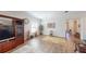 Spacious living room with wood floors, a ceiling fan, and a cozy atmosphere at 12403 Brick Cobblestone Dr, Riverview, FL 33579