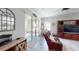 Open living room with hardwood floors and natural light from sliding glass doors at 12403 Brick Cobblestone Dr, Riverview, FL 33579