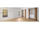 Bright bedroom with natural light from two windows and a double door closet at 1368 Noell Blvd, Palm Harbor, FL 34683