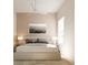 Serene bedroom featuring neutral tones, a ceiling fan, natural light from the window, and comfortable decor at 16 Heather Ter, North Port, FL 34286