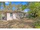 This backyard features a small building and ample space for outdoor activities at 164 Nw Lincoln N Cir, St Petersburg, FL 33702