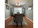 Elegant dining room with decorative light fixture and stylish furnishings, great for entertaining at 2021 E Del Webb Blvd, Sun City Center, FL 33573