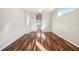 Spacious bedroom with sleek wood floors, abundant natural light, and neutral walls awaits personal touches at 23523 Gracewood Cir, Land O Lakes, FL 34639