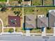 Aerial view of a property showing the layout of the house, backyard, and surrounding area at 248 Argyll Dr, Spring Hill, FL 34609