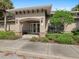 Close up shot of the building entrance of the building featuring bushes and plants at 248 Argyll Dr, Spring Hill, FL 34609
