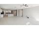 Open-concept living space with tile flooring connects to the kitchen at 248 Argyll Dr, Spring Hill, FL 34609